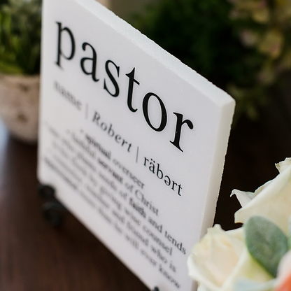 a close up of a sign on a table